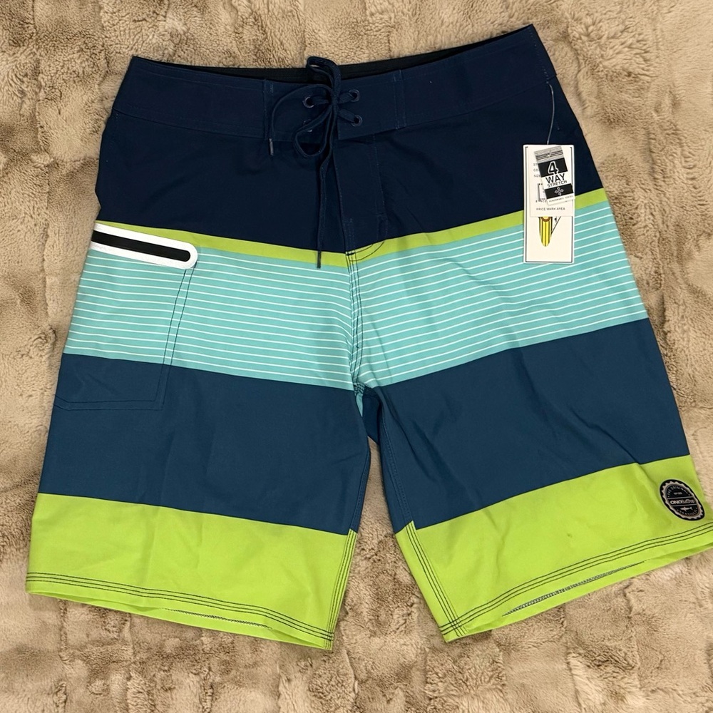 Island Daze Lure 4 Way Stretch
size 29 Navy, Teal & Lime Striped Board Shorrts